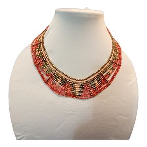 Necklace red color coral beads. With brass metal accent beads.